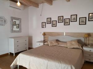 Postel nebo postele na pokoji v ubytování Arco Della Neve Guest House