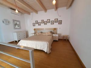 Postel nebo postele na pokoji v ubytování Arco Della Neve Guest House