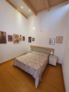 Postel nebo postele na pokoji v ubytování Arco Della Neve Guest House