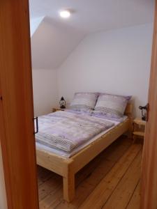 Un pat sau paturi într-o cameră la Haus Schritte
