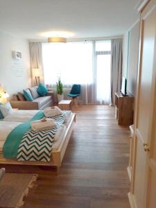 Postel nebo postele na pokoji v ubytování Apartment Goisernperle