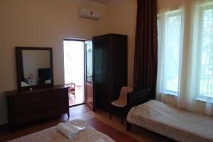 Letto o letti in una camera di Marshal Resort Kobuleti