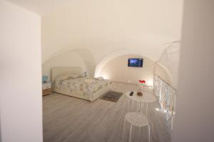 Posteľ alebo postele v izbe v ubytovaní BED CASA VACANZA VIA GALLIPOLI - CORTE BARI