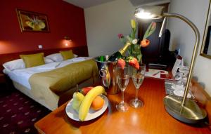 Postel nebo postele na pokoji v ubytování Hotel Tilia