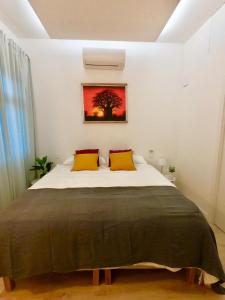 Un pat sau paturi într-o cameră la Gozamena Zarautz (Surf/Mendi)