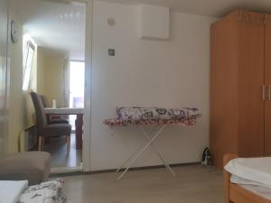 Postel nebo postele na pokoji v ubytování Apartman Bukulja
