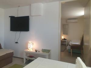 Postel nebo postele na pokoji v ubytování Apartman Bukulja