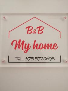 Znak z napisem "Mój dom na ścianie" w obiekcie Bed and Breakfast My home w Pizie