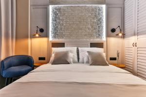 Voodi või voodid majutusasutuse Boutique Hotel Tate By Aycon toas