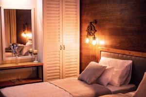 Voodi või voodid majutusasutuse Boutique Hotel Tate By Aycon toas