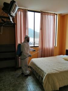 Postel nebo postele na pokoji v ubytování Hotel Sánchez Internacional