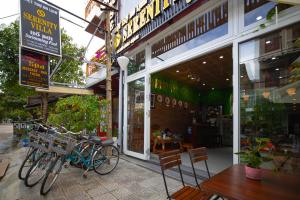 a store front with bikes parked outside of it at Serenity Villa Hoi An in Hoi An
