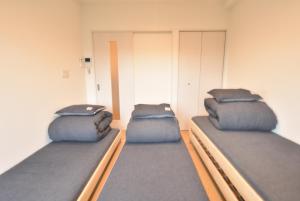 Katil atau katil-katil dalam bilik di Enzo Chidoribashi