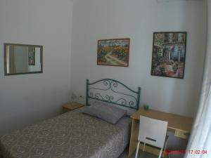 Postel nebo postele na pokoji v ubytování un passo dal mare