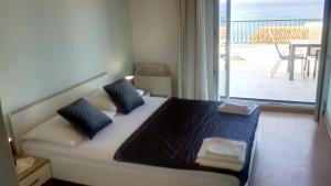 Un pat sau paturi într-o cameră la Villa Ante Split-Podstrana