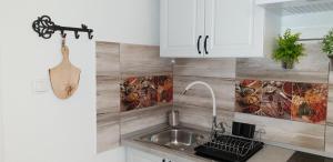 Kuchyň nebo kuchyňský kout v ubytování Apartment Marko