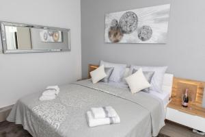 Postel nebo postele na pokoji v ubytování Apartments Ozrenka