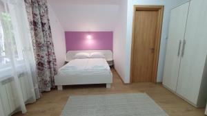 Postel nebo postele na pokoji v ubytování Casa Balint