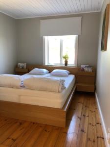 Letto o letti in una camera di Grindhuset