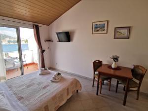 Postel nebo postele na pokoji v ubytování Apartments Marija