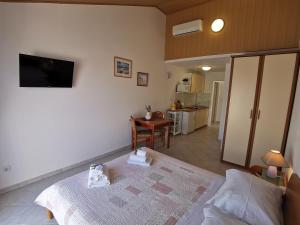 Postel nebo postele na pokoji v ubytování Apartments Marija
