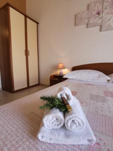 Postel nebo postele na pokoji v ubytování Apartments Marija