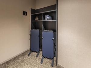 two refrigerators in a corner of a room at Far East Village Hotel Tokyo Ariake in Tokyo
