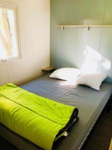 Postel nebo postele na pokoji v ubytování Camping Du Lion