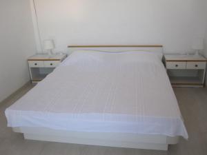 Posteľ alebo postele v izbe v ubytovaní Apartman Zaglav