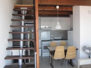 Kuchyňa alebo kuchynka v ubytovaní Apartman Zaglav