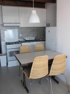 Kuchyňa alebo kuchynka v ubytovaní Apartman Zaglav