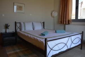 Postel nebo postele na pokoji v ubytování Lotus Sea View Apartments