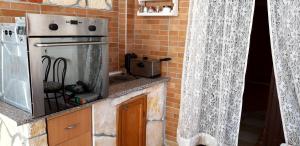 Kuchyň nebo kuchyňský kout v ubytování Apartment "Mislav"