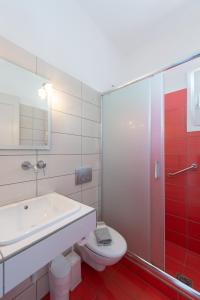 Ванная комната в Morpheas Pension Rooms & Apartments