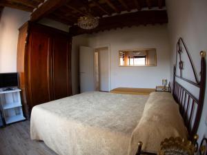 Кровать или кровати в номере Lucca in Corte near the city centre