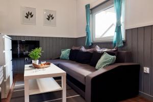 Posezení v ubytování Domki pod klonem