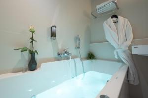 
Ванная комната в Best Western Premier Masqhotel

