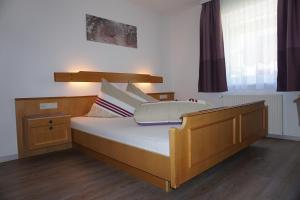 Posteľ alebo postele v izbe v ubytovaní Haus Bergheimat