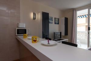 Kuchyň nebo kuchyňský kout v ubytování Playa Honda Lovely Home Las Americas -