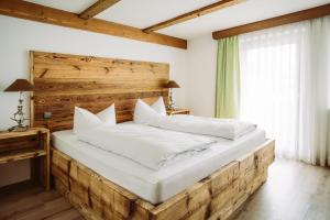 Postel nebo postele na pokoji v ubytování Der Bären in Zell
