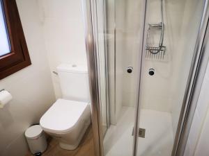 Koupelna v ubytování AG Apartamentos en Conil + 37 fotografií