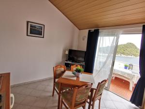 TV a/nebo společenská místnost v ubytování Apartments Marija
