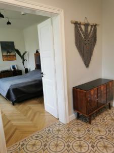 Ліжко або ліжка в номері Apartament Podoficerski z sauną