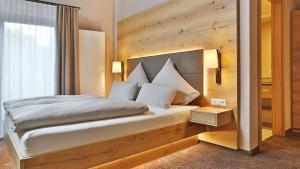 Postel nebo postele na pokoji v ubytování Hotel Restaurant Waldsägmühle