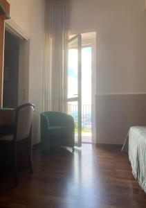 A bed or beds in a room at Hotel ristorante Bellavista