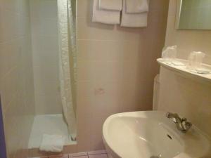 Koupelna v ubytování Hotel Calvaire