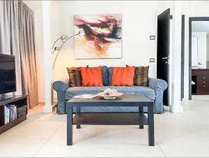 Телевизор и/или развлекательный центр в Taonasi Mazzarò Apartments