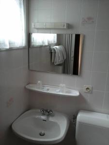 Koupelna v ubytování Hotel Calvaire