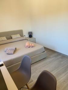 Postel nebo postele na pokoji v ubytování Brezza di Mare