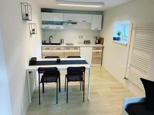 Kuchyň nebo kuchyňský kout v ubytování Apartmány Klárka